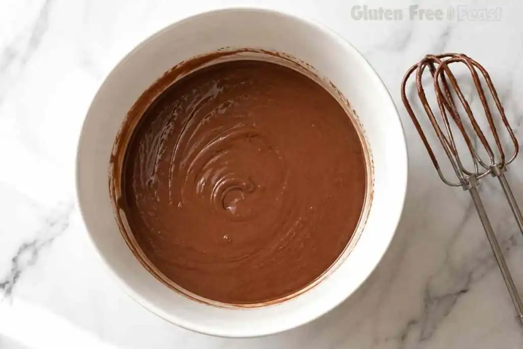 Smooth chocolate cake batter ready for baking